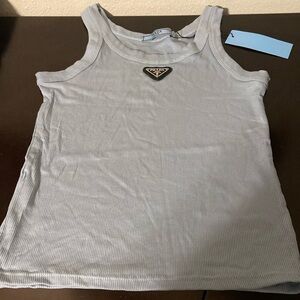 Baby blue tank with triangle design.